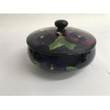 A moorcroft bowl with lid decorated with pansy 6 c