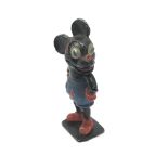 An unusual cast lead figure of Mickey Mouse with p