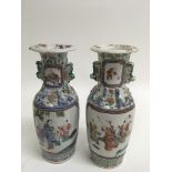 A matched pair of late 19th Chinese vases painted