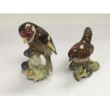 Two small Beswick figures of birds, approx heights
