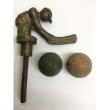An unusual brass handle formed as a cricketer plus