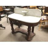 A marble topped washstand fitted with a single dra