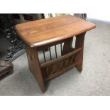 An Ercol Windsor magazine rack.