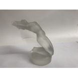 A Lalique figure in the the form of a reclining nude ,13 cm