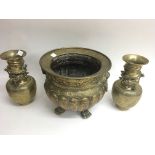 A pair of Chinese type brass vases with engraved d
