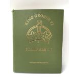 A King George VI Stanley Gibbons stamp album conta