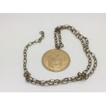 A 9ct gold pendant on chain, approx 9.1g.