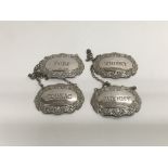 Four silver spirit labels, Birmingham hallmarks.