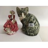 A royal Doulton figure and a winstanley cat
