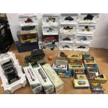 A collection of boxed diecast vehicles including D