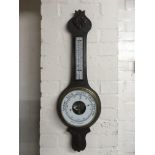 An oak wall barometer.