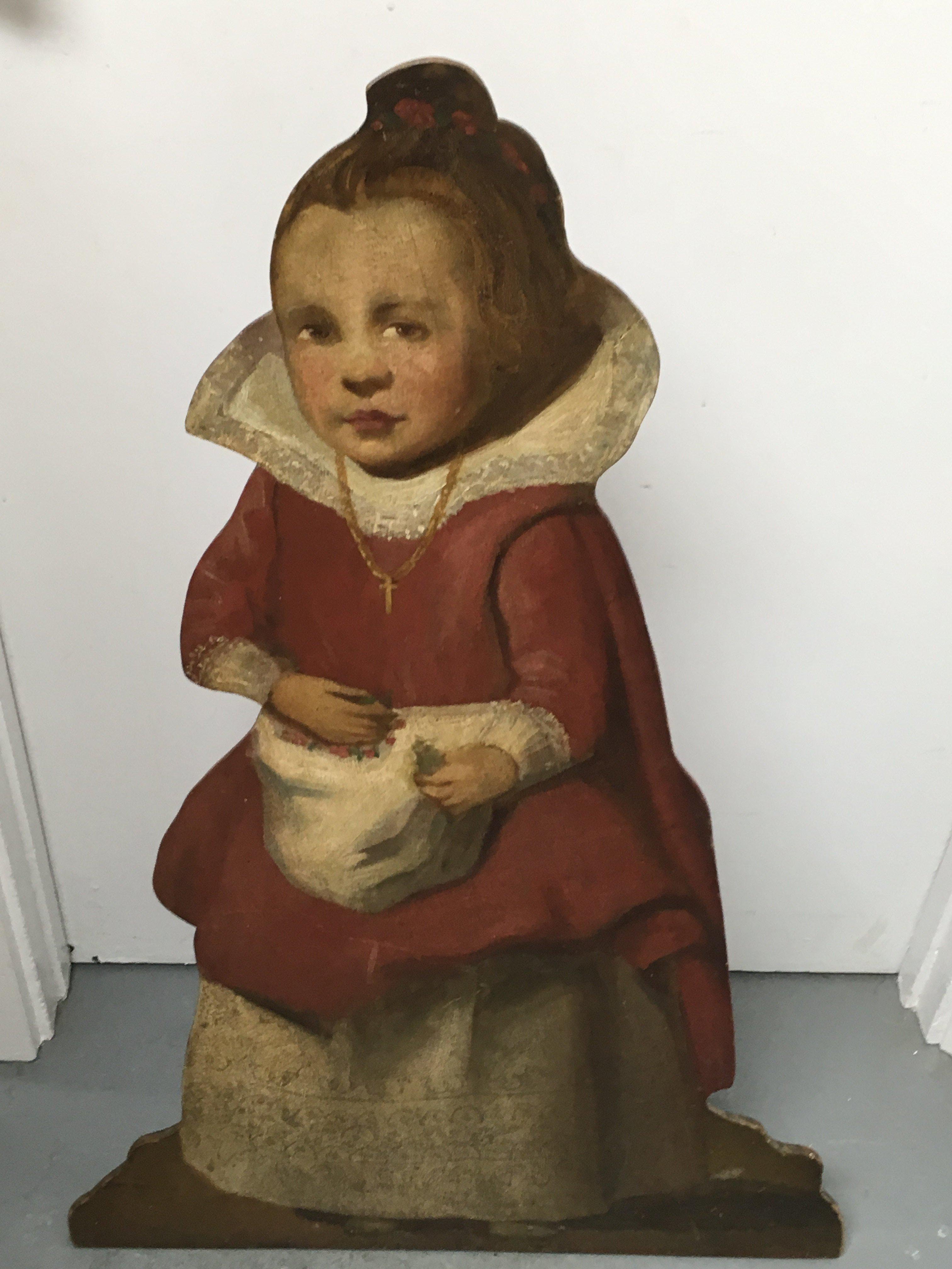 An 18th century dummy board in the form of a young