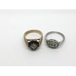 A 9ct gold cluster ring and a silver example.Appro