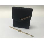 A Baume & Mercier 18ct gold diamond set bracelet w