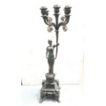 A heavily impressive bronze candelabra of a female