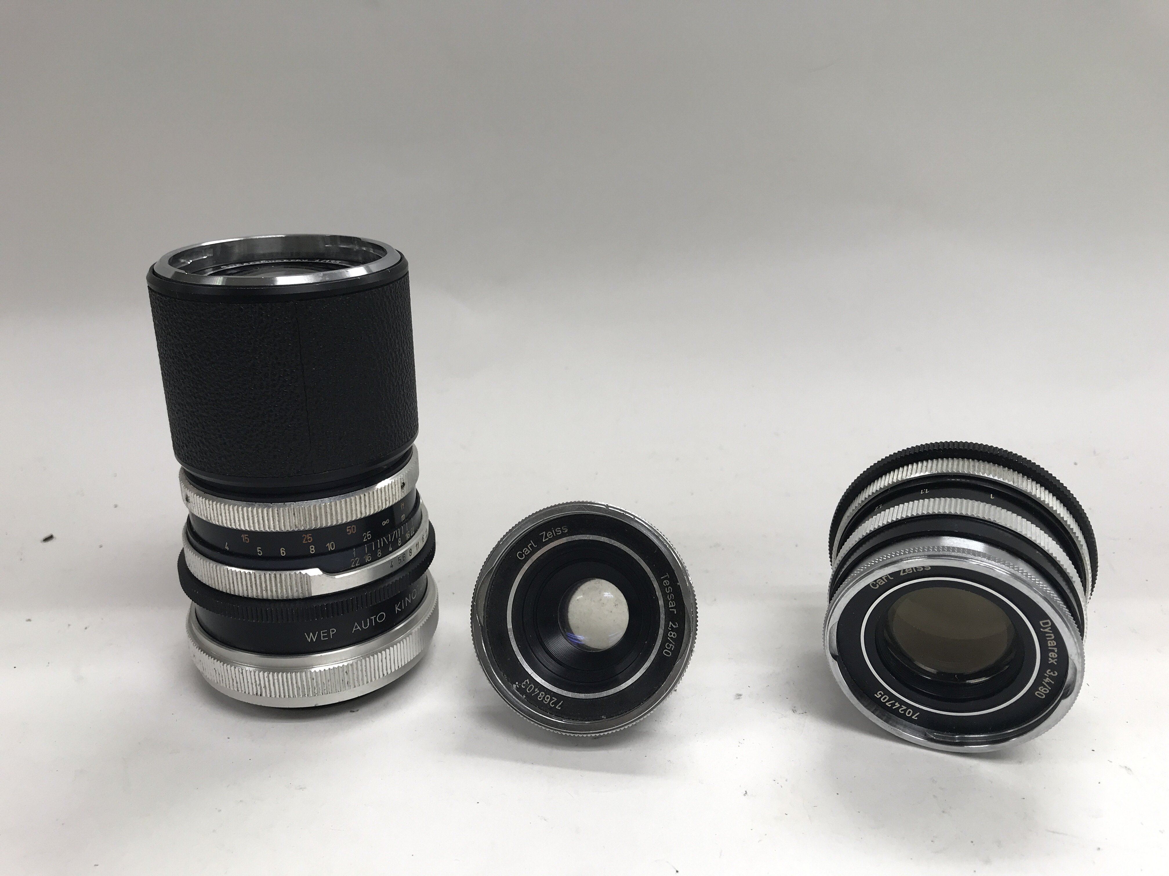 A group of three Carl Zeiss lenses to include a Su