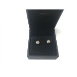 A pair of 9ct gold white stone earrings. Weight ap