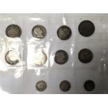 A collection of eleven worn George III coins.