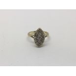 An 18ct gold ring set with multiple diamonds, appr