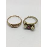 A 9ct gold ring set with chip white and red stones