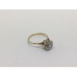 A 9ct gold ring set with a large CZ stone, approx