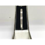 A 18 ct white gold bracelet inset with two rows of cut diamonds 22 grams