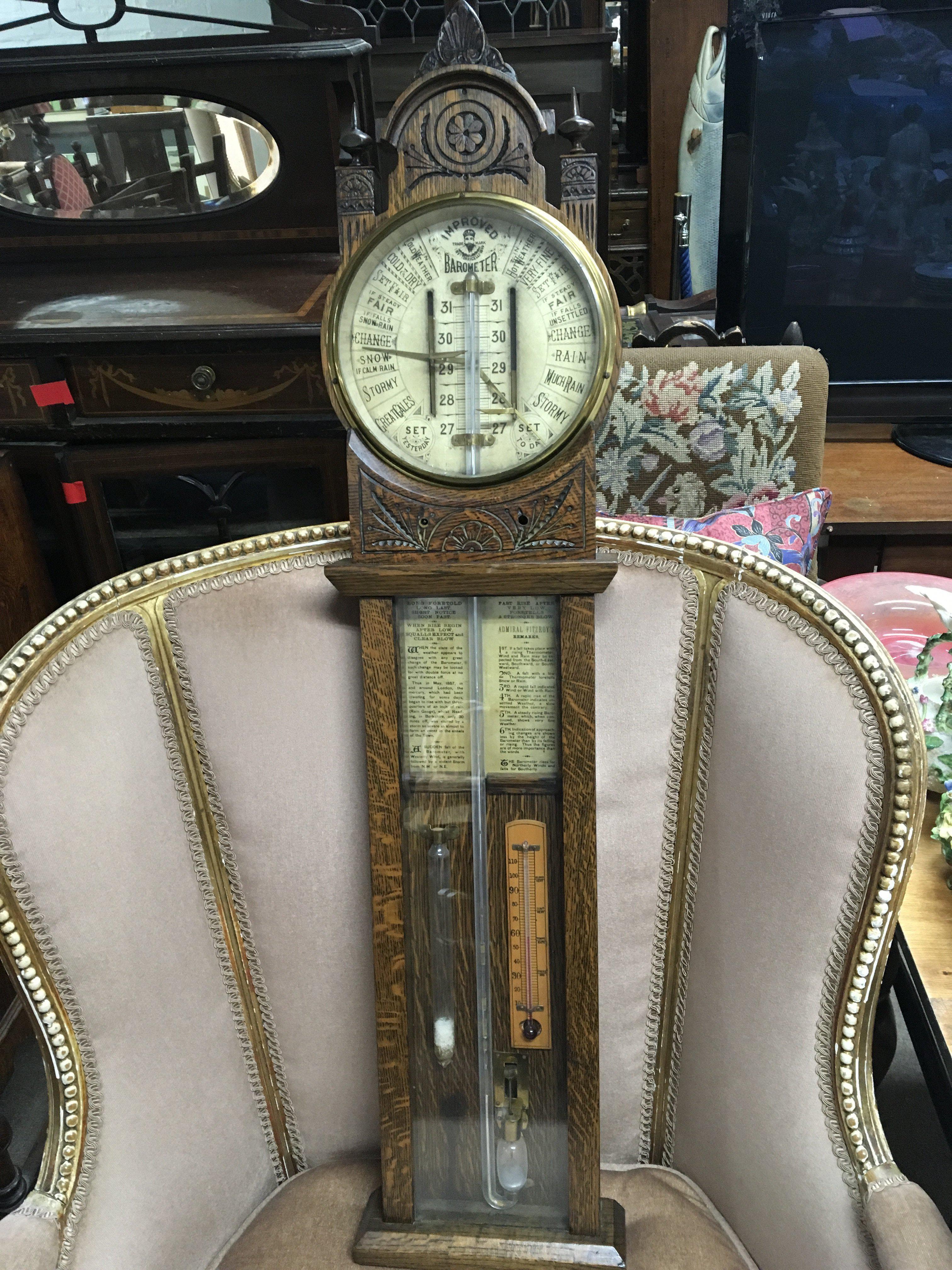 A Victorian oak Admiral Fitzroy Barometer with mer