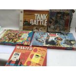 A collection of vintage board games including Dads Army, Tank battle, Radar search, Action man and
