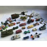 A collection of playworn diecast vehicles including Dinky, Corgi, Matchbox etc