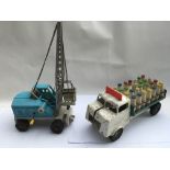 Triang tinplate milk lorry and Krupp , West German working crane