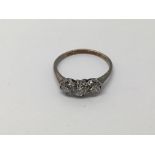 A three stone diamond ring, approx 1.6g and approx