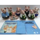 A set ofWade Natwest pigs plus extras and associated paperwork.