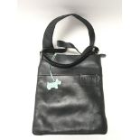A black leather Radley crossover bag with dust cov