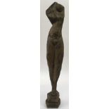 A modernist, carved wood sculpture of a female tor