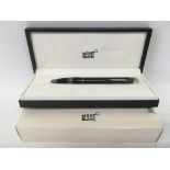 A boxed Mont Blanc pen.