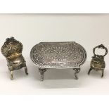 A continental 925 miniature silver table with repo