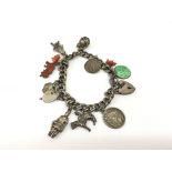 A silver charm bracelet.Approx 46.5g