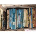 A box of children's Annuals including Lion