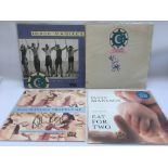 Four signed 10,000 Maniacs records comprising two