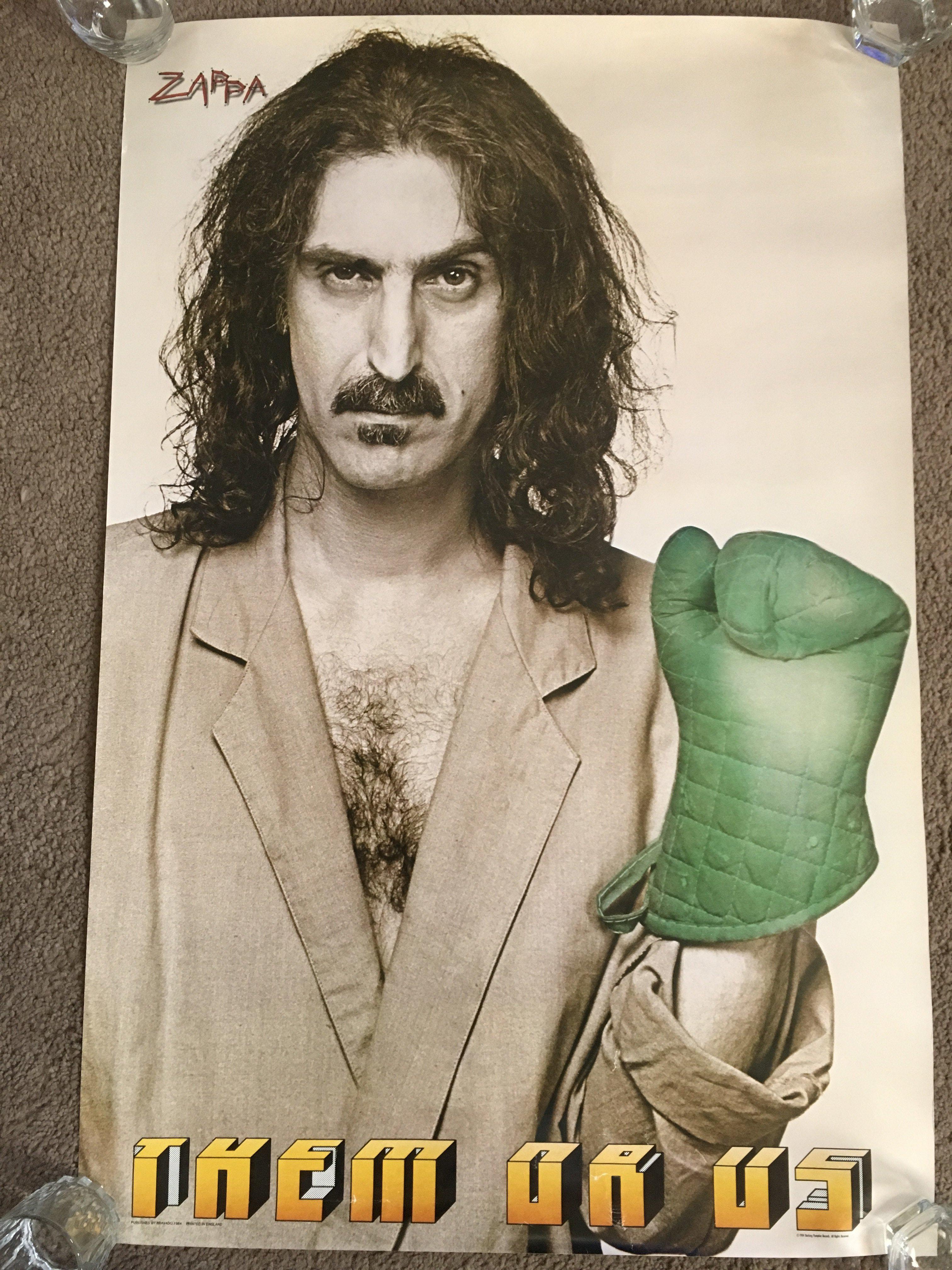 Two vintage Frank Zappa posters, approx 59cm x 89c
