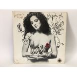 A fully signed 'Mother's Milk' LP by Red Hot Chili