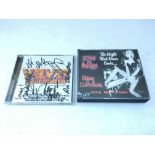 Two signed CDs comprising 'The Velvet Goldmine' soundtrack featuring the signature of Ron Asheton,