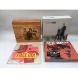 A collection of REM CDs to include R.E.M. Live, Live At The Olympia, The Automatic Box, Around The