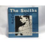 A signed 'Hatful Of Hollow' LP by The Smiths. Sign