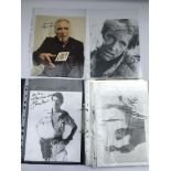 A binder containing various signed publicity print
