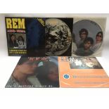 A collection of REM vinyl records and fanzines inc