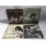 Four Patti Smith signed 7inch singles.