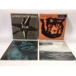 Four REM vinyl records comprising 'Chronic Town' E
