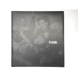 A hardback coffee table book entitled Punk by Cole