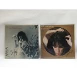 Two signed Patti Smith Group LPs comprising 'Wave'